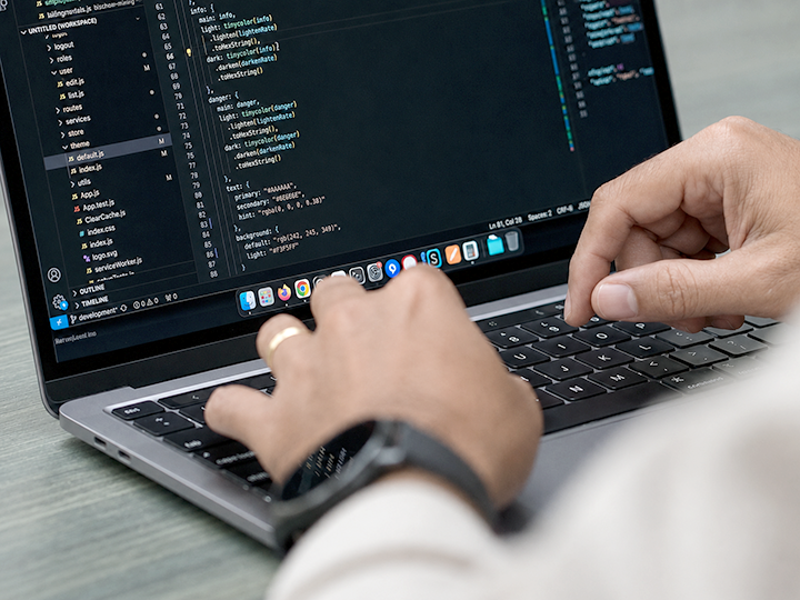 coding on laptop